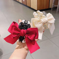 pearl bow hair claw