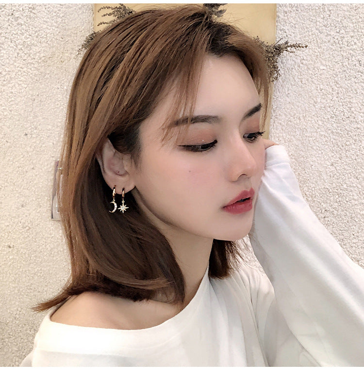 Star & Moon Huggie Hoop Earrings close-up detail