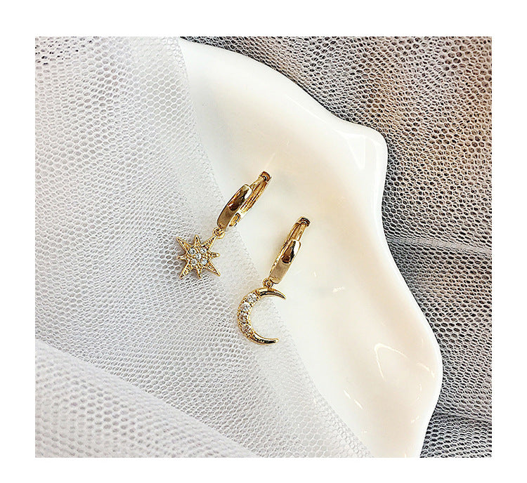 Star & Moon Huggie Hoop Earrings from different angle